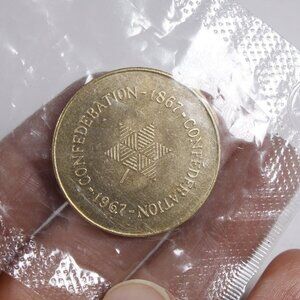 Canada Confederation coin in original plastic wrapper, Canadian Centenary token
